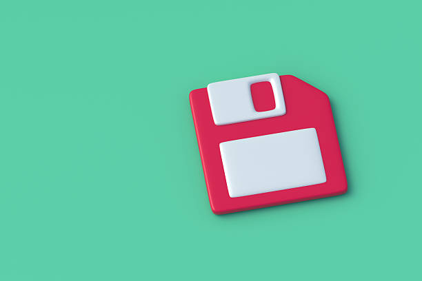 Floppy disk on green background. Magnetic diskette. Minifloppy or microfloppy. Obsolete data storage. Save icon. Copy space. 3d render