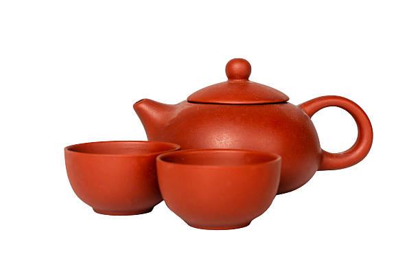 Ceramic teapot with bowl cups for tea time, break, ritual ceremony. Kitchen ware for drink, hot morning beverage, isolated on white background