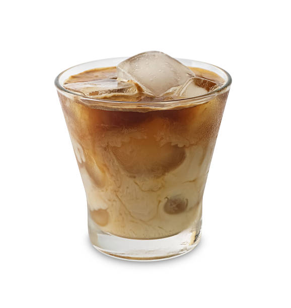 istock Iced coffee with milk in glass on white background 2261556125