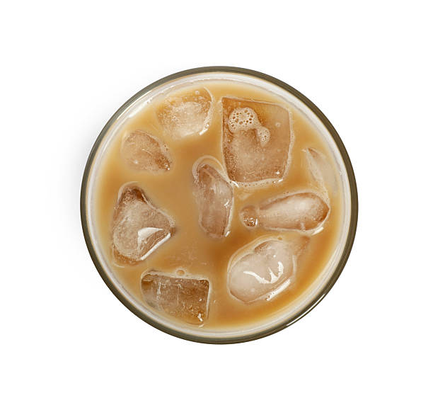 istock Iced coffee with milk in glass isolated on white, top view 2261556131