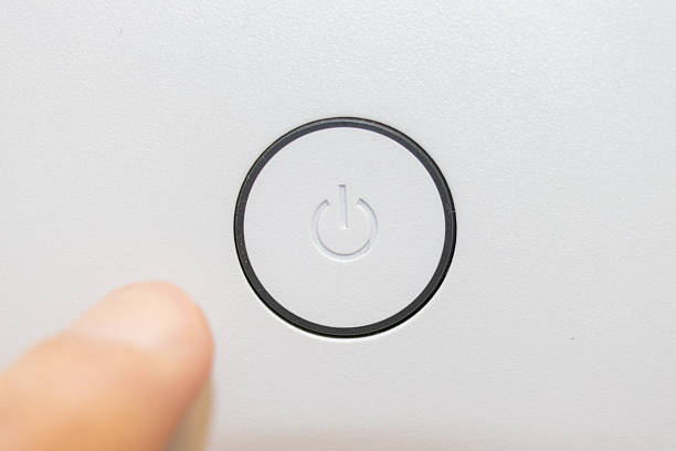 Press the power switch of the device with an index finger