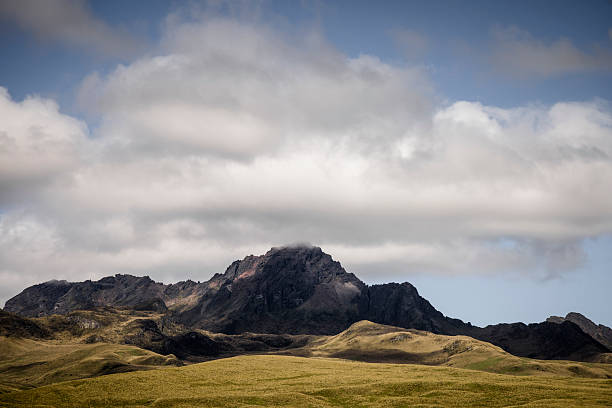 Mountain, alpine meadow and lofty clouds, Cotopaxi