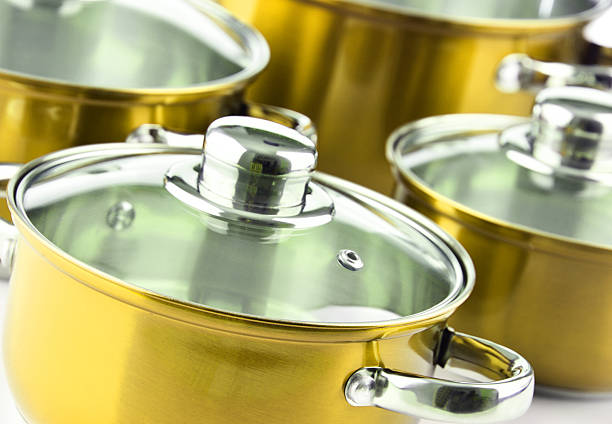Composition with a set of steel pots.