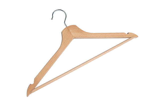 a wooden hanger on a transparent surface