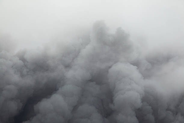 Fire, clouds of smoke against the sky, environmental disaster