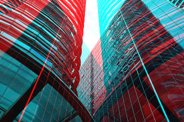 Glitch effect that overlays multiple perspectives of a contemporary glass skyscraper using a high-contrast red and turquoise color palette. the visual layers merge rigid window grids with fluid curved silhouettes of building exteriors and the industrial texture of a perforated metal canopy. sharp vertical lines and sweeping structural arcs intersect to create a surreal geometric interpretation of urban development. the vibrant color grading and complex layering highlight themes of digital innovation modern city infrastructure and dynamic structural design.