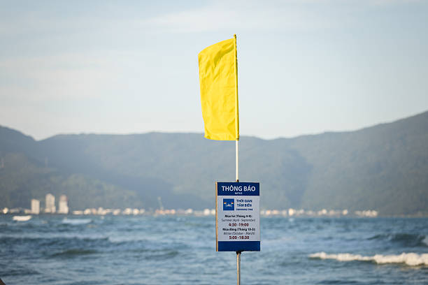 Breaking waves on South China sea with swimming sing.Da Nang - Vietnam.