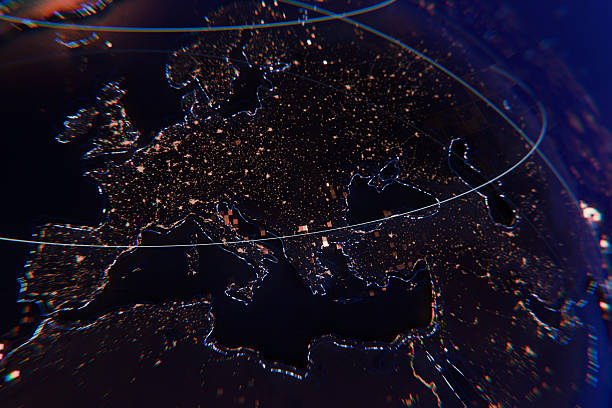 Futuristic planet Earth at night featuring glowing city lights and digital data lines. High-tech global network concept with a dark cinematic aesthetic for business and technology.