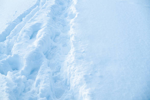 Footsteps in the snow, trail in the fresh snow.
