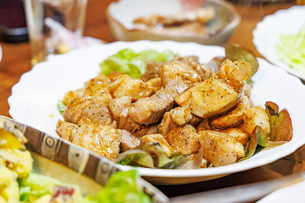 A serving of bite-sized sauteed pork