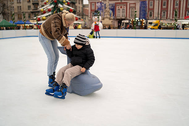 Mother and son on ice skating