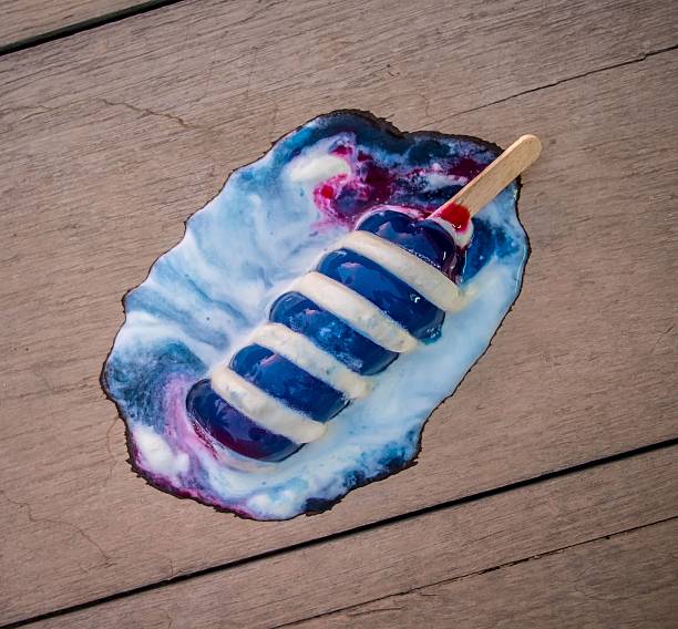 Melting blue popsicle with cream swirl