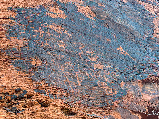 Ancient Petroglyphs on the rocks of Valley of Fire State Park, Nevada.