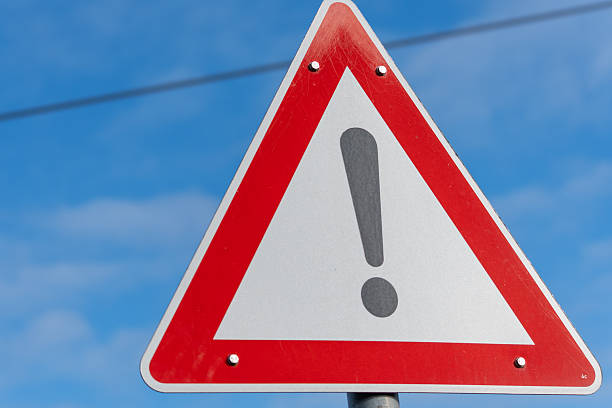 Attention sign with exclamation mark in triangle. Outline 3d icon, red color and transparent glass material. Isolated on white background