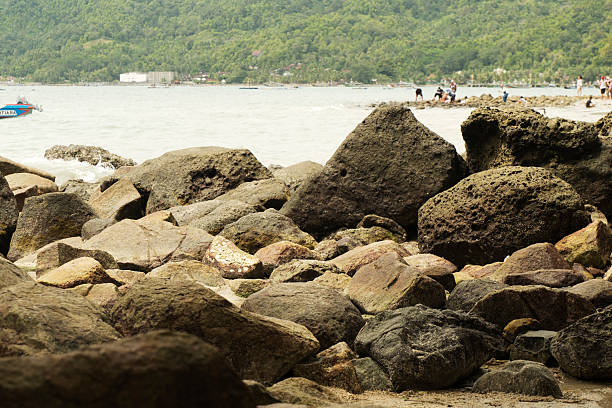 Ocean Waves Reaching Rocky Beach  Rugged Coastal Environment and Nature Concept Image