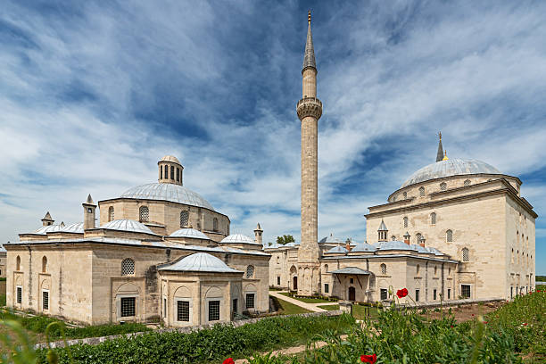 Historic Ottoman architecture of Sultan Bayezid 2 Complex under a blue cloudy sky in Edirne, Turkey. Photographed in May 2022.