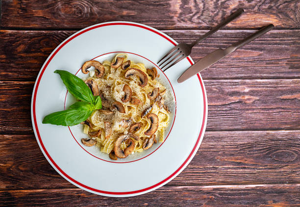 Tagliatelle pasta with parmesan and mushrooms