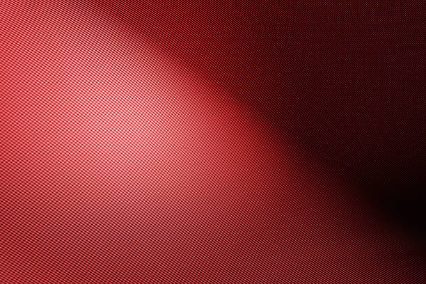 Luxury deep burgundy red carbon fiber texture with dramatic diagonal lighting and premium metallic finish