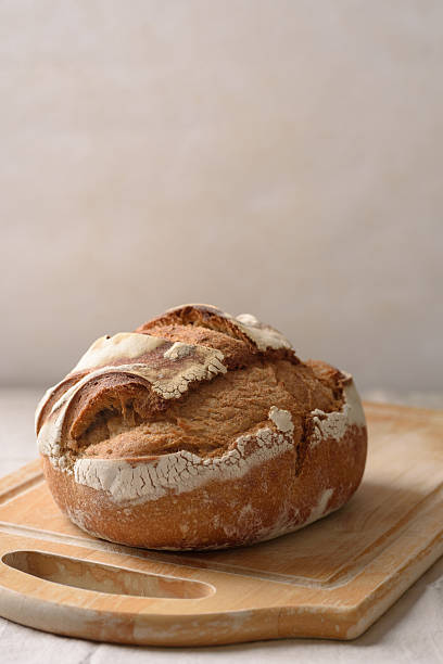 Artisan sourdough on simple white surface