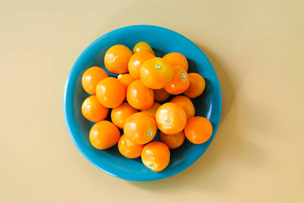 Fresh Cape Gooseberry on color background.