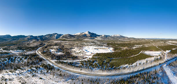 Aerial View of the Parc National des Grands Jardins National Park, Cherlevoix, Quebec, Canada at sunset.Filmed outside the national park boundary, the Mont du Lac Des Cygnes and the 381 Road are visible in the video.