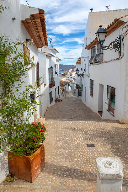 One of the beautiful traditional streets in the old town area of Altea in Spain.