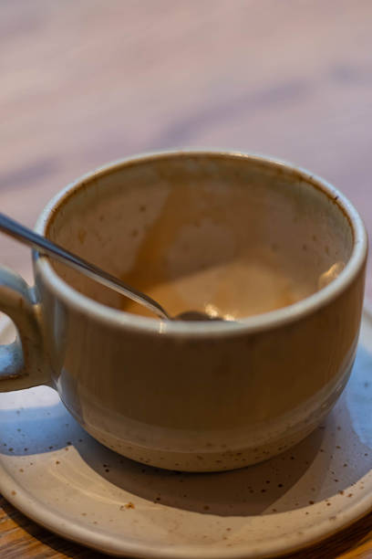 dirty white coffee cup on white background.