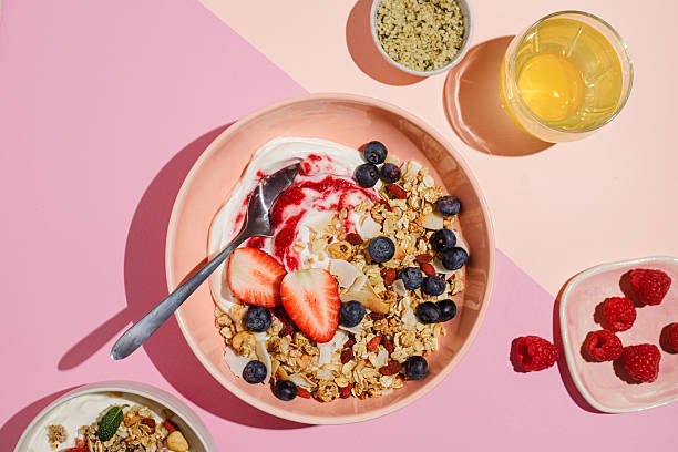 Healthy Yogurt Bowl with Granola and Fresh Berries for Breakfast