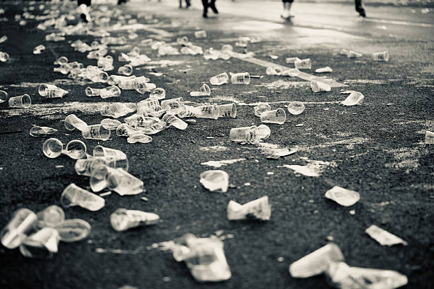 At the end of the marathon - many empty plastic cups on the roadside