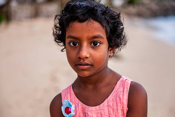 Sri Lankan little girl posing on the beach, Sri Lanka
