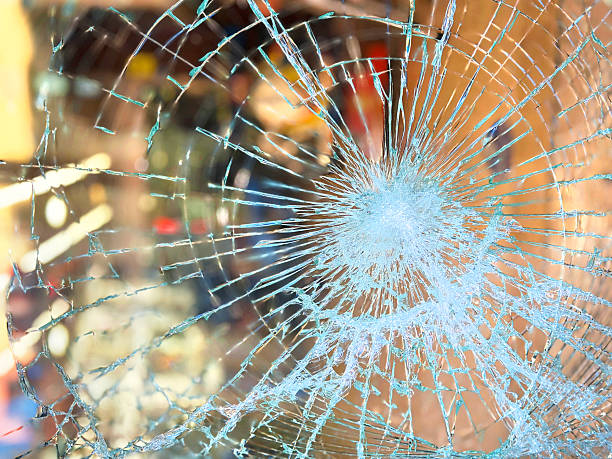 Close up broken glass window pattern