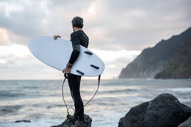 The excited surfers preparing for action.