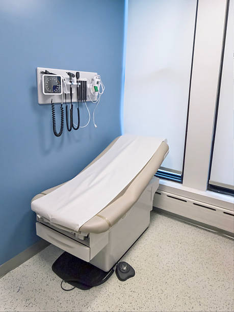 istock Empty doctor's examination room with exam table in hospital interior 2262034375