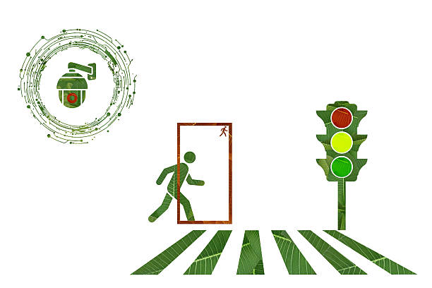Close-up of a woman hand pushing a pedestrian traffic light button to request a change in the lights for crossing road safely