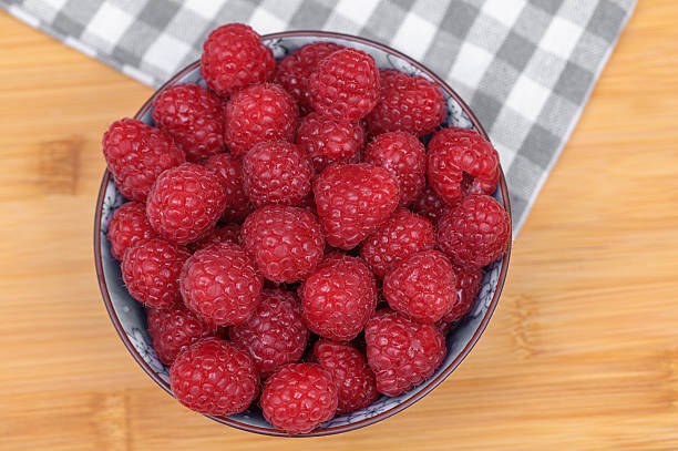Fresh raspberries picked straight from the garden in summer