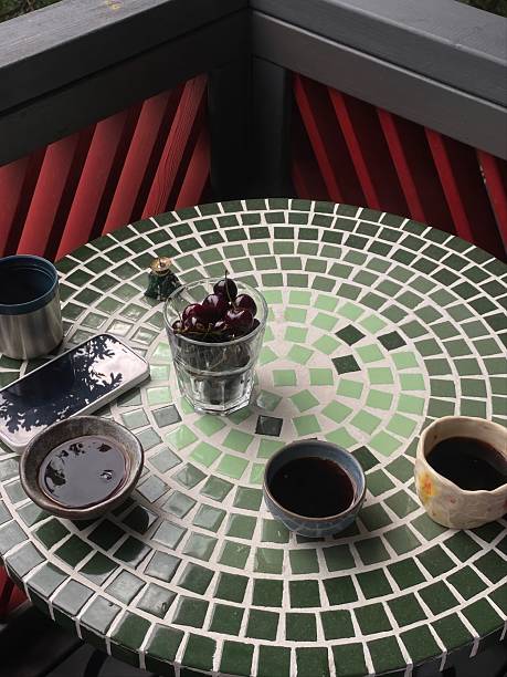 Charming Mosaic Table Setting with Cherries and Drinks
