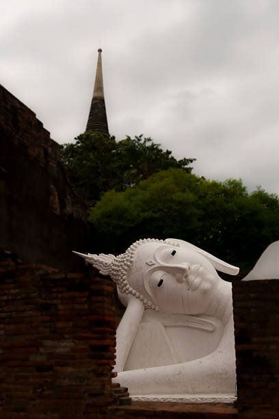 White Buddha at the Wat Mahatat in the town of Ayutthaya , in Thailand