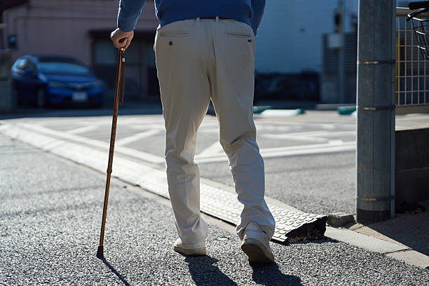 Senior Asian man wandering outside