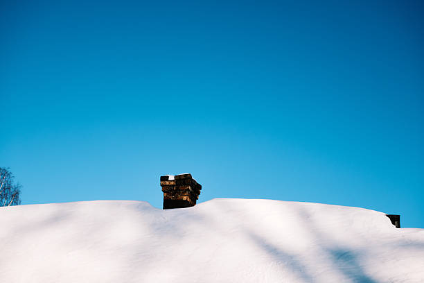 Rooftop of village covered by deep snow