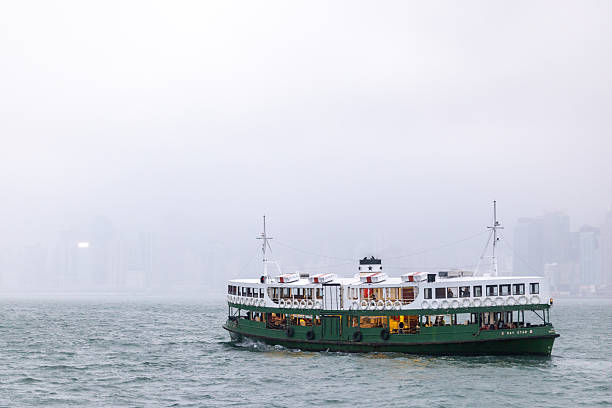 Star Ferry cruising through the fog