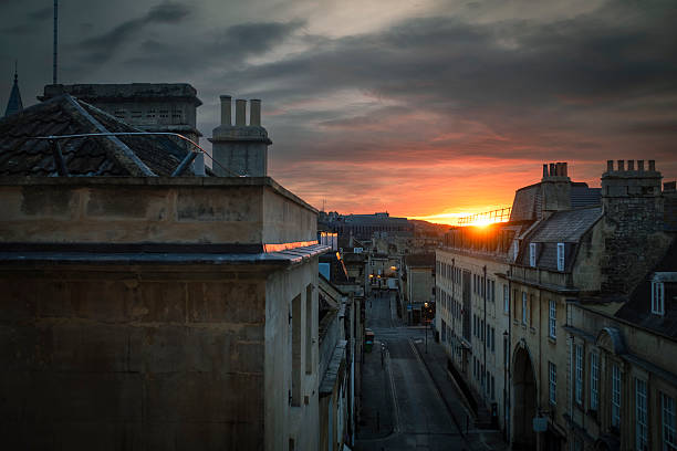 Orange sunset from a rooftop on a urban scene on a cloudy sky in Bristol, England