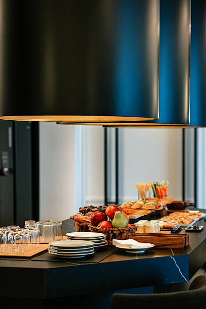 Modern Hotel Breakfast Buffet Display with Fresh Fruit and Tableware