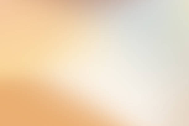 istock Gradient background showing soft light blending orange, yellow and beige tones 2262225359