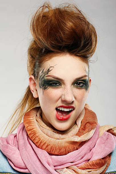 portrait of glam punk redhead female posing