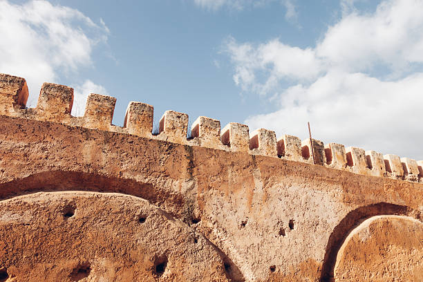 old brown construction in africa morocco and sky  near the tower