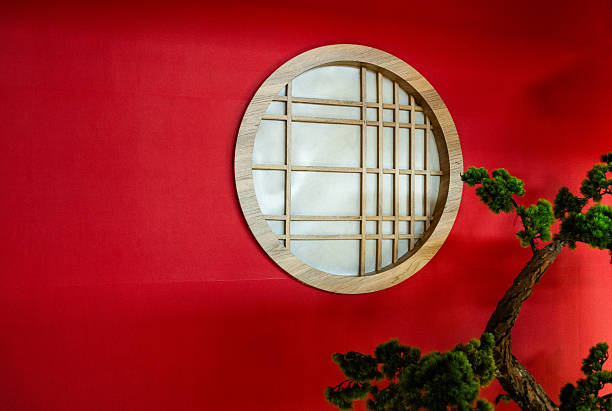 Traditional Zen Japanese style window and bonsai tree
