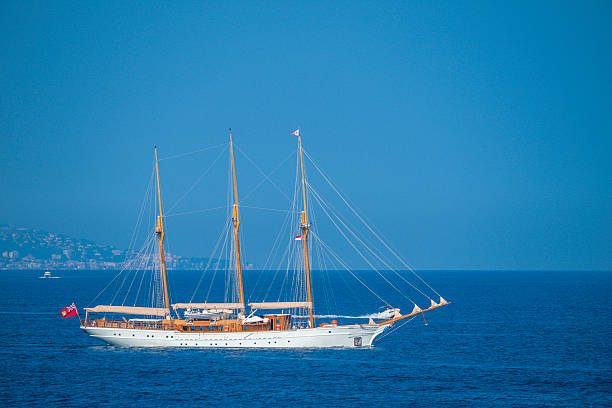 Baboon sailing yacht in the Mediterranean sea in the bay at Monaco and Baie de Roquebrune during a beautiful summer day on the Côte d'Azur.