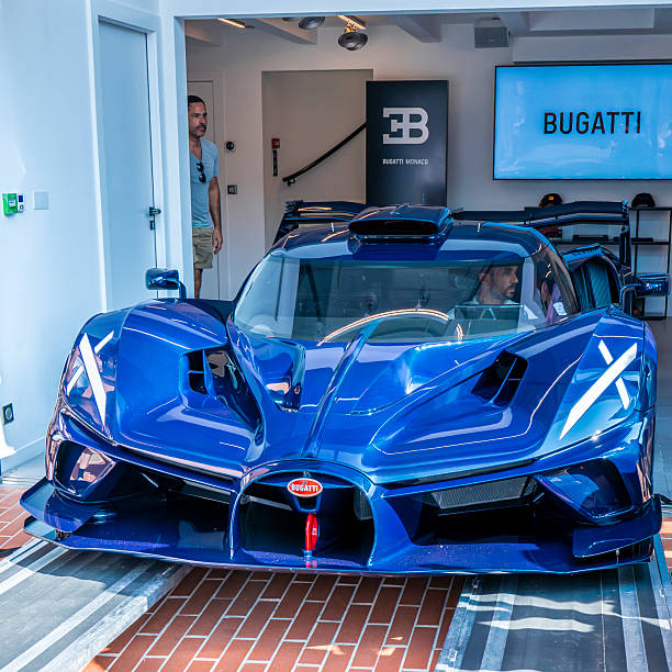 Bugatti Bolide track-only hypercar being delivered at the Monte Carlo Bugatti dealership.