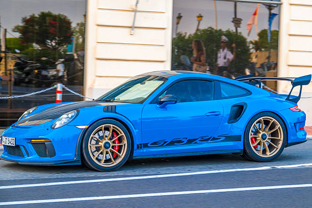 Porsche 911 GT3 RS sports car (generation 991) driving on the street of Monte Carlo on the Beau Rivage section of the Monaco race track.
