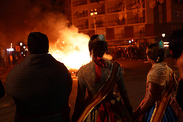 Valencia, Spain - March 19 2023: The burning of a statue during the Crema. The Crema is the act of setting fire to the monuments of the Fallas, which is the final night of this festivity. The Valencia Las Fallas declared Intangible Cultural Heritage of UNESCO since 2016
